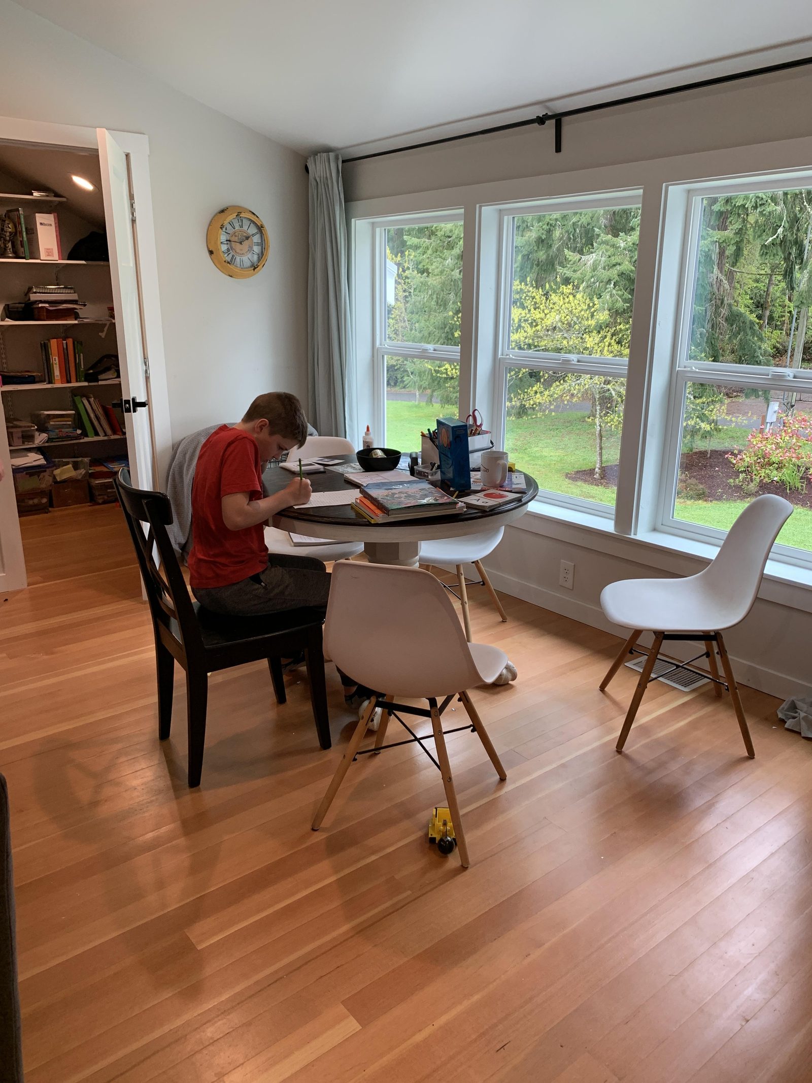 A child doing schoolwork at the table